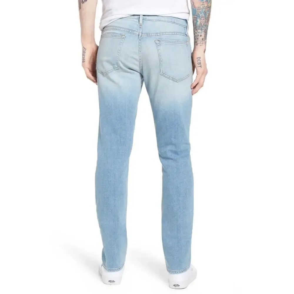 FRAME Denim L'Homme Slim fit distressed mid rise straight tapered jeans Finn 36